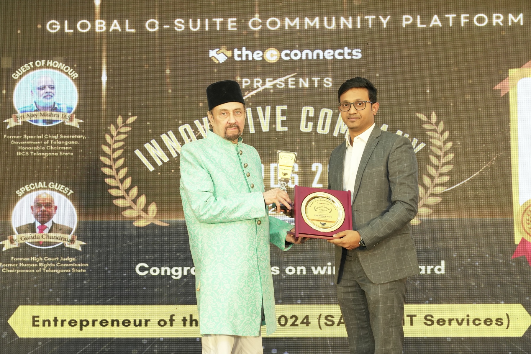 Vasumithra Therli receiving the Entrepreneur of the Year 2024 award for SaaS and IT Services